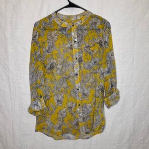 Sheer yellow blouse with floral print